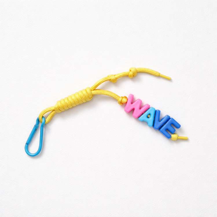 key ring brelok napis wave yellow żółty