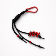 key ring brelok napis joy czarny czerwony black red