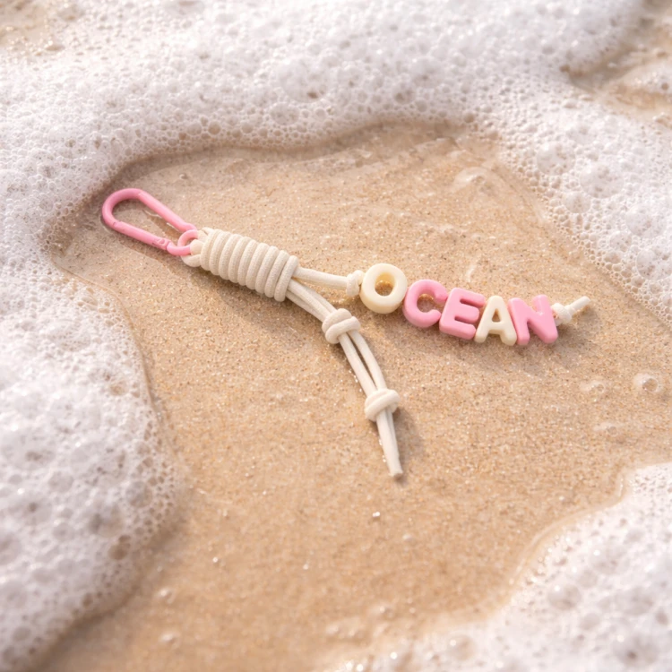key ring ocean pink white