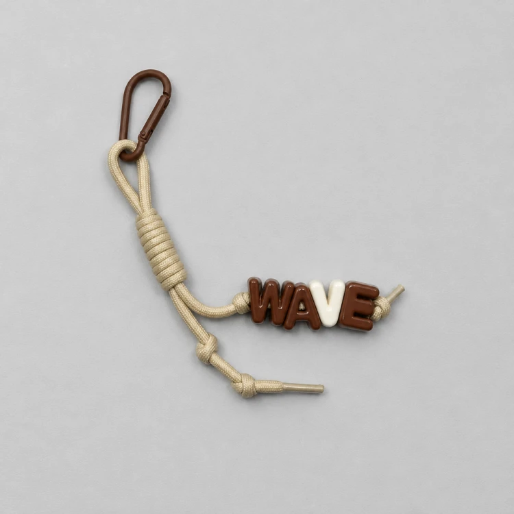 key ring brelok napis wave beż brąz
